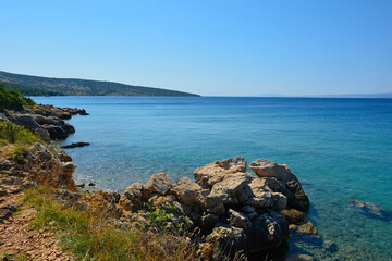 A coastal path south of the town of Punat on Krk Island in Primorje-Gorski Kotar County in western Croatia during late summer
