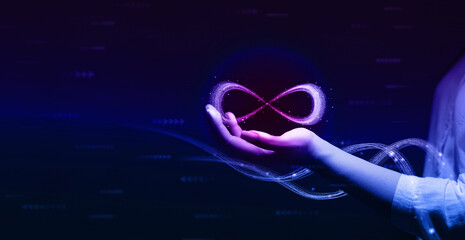 Metaverse Technology concepts. Hand holding virtual reality infinity symbol.New generation...