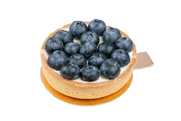 blueberry tart isolated on white background. Mini tart with cream and fresh blueberries isolated on white