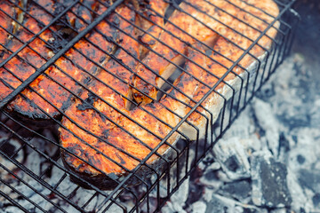 cooking fish outdoors barbecue close-up charcoal meal
