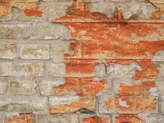 Brown and orange brick wall.
