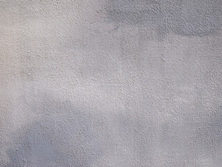 Fototapeta na wymiar Rough gray surface. Abstract neutral background.