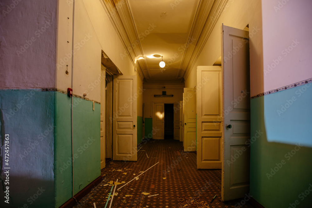 Sticker dark and creepy corridor of old abandoned mental hospital at night