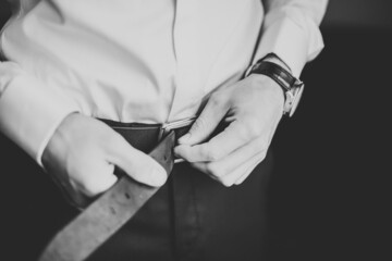 Beautiful man, groom posing and preparing for wedding