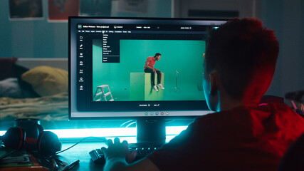 Unrecognizable teenager removing chromakey on photo and loading 3D background while learning to use...