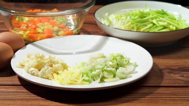 Chinese style home-cooked stir-fry with garlic sprouts and scrambled eggs