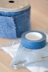 Blue fabric ribbon and blue tape