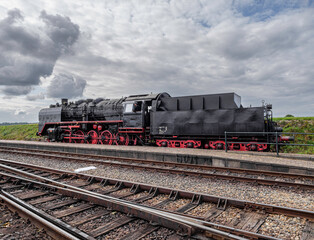 Fototapeta na wymiar Steam locomotive of the Veluwsche Stoomtrein Maatschappij. The VSM runs steam locomotives between Dieren and Apeldoorn in the Dutch province of Gelderland