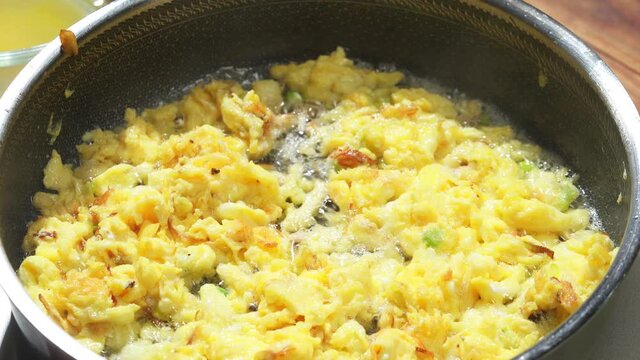 Chinese style home-cooked stir-fry with garlic sprouts and scrambled eggs