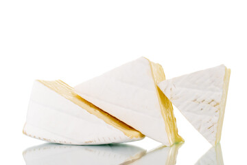 Three fragrant pieces of brie cheese, close-up, isolated on white.