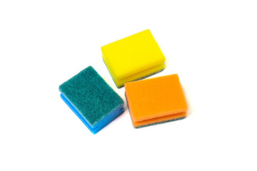 Dishwashing sponges of different colors on a white background. Close-up. Copy space.