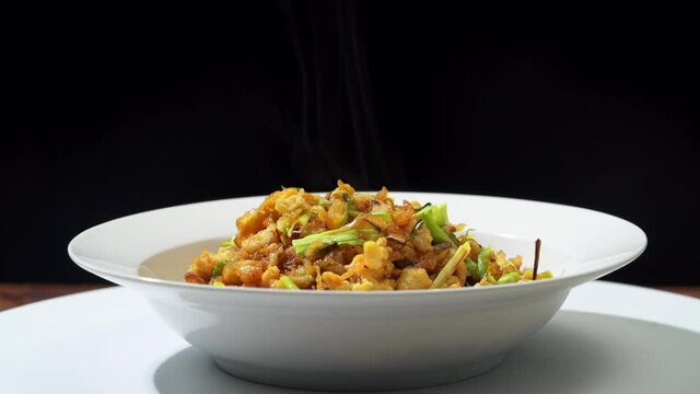 Chinese style home-cooked stir-fry with garlic sprouts and scrambled eggs