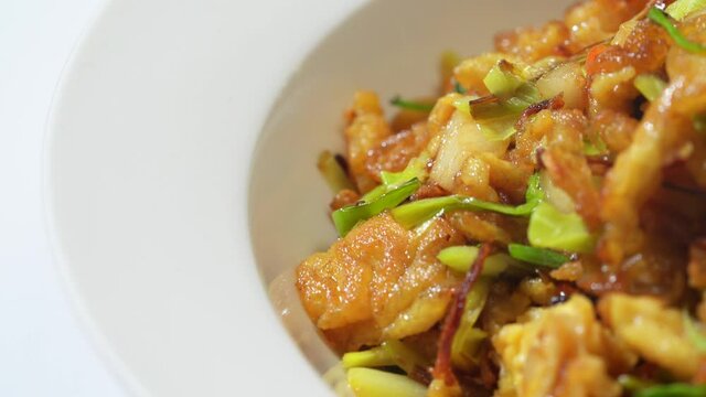 Chinese style home-cooked stir-fry with garlic sprouts and scrambled eggs