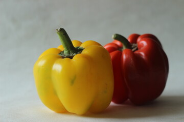 Red yellow bell peppers. Bell pepper or Capsicum annuum, also called sweet pepper or capsicum