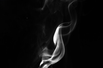 Smoke effect on a black background. Fog or mist texture, abstract and flowing