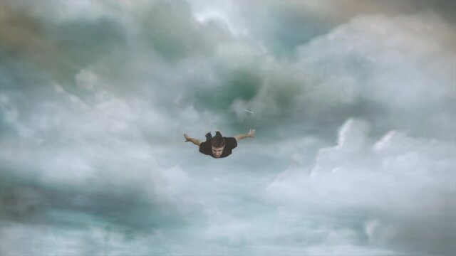 Man Flying Through Clouds In Sky Super Hero Concept. Barefoot man with a mustache flying through clouds in sky like a super hero