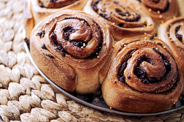 Homemade cinnamon rolls made from yeast dough, Chelsea rolls with cinnamon and raisins. Homemade...