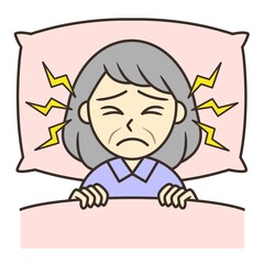 An elderly woman suffering from sleeplessness due to tinnitus