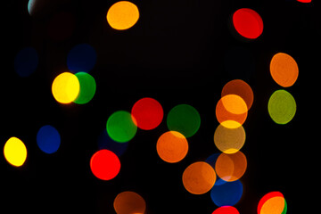 Abstract colorful bokeh lights background, blurred christmas lights for holiday decoration