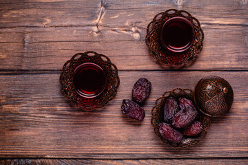 Dried dates fruit and tea. Popular fruit of Ramadan.