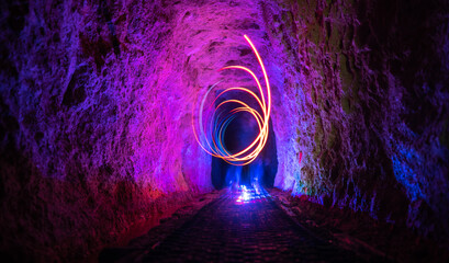 Light painting in the Historic rail tunnel, a part of an old gold mine transportation system located in Collins Drive Circuit, New Zealand