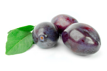 Fresh plums isolated on white