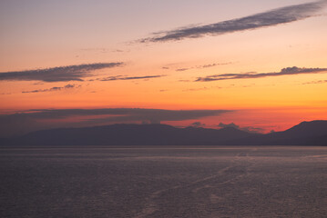 Sea and mountains on the background of a beautiful sunset in the Crimea