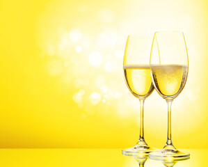 Two champagne glasses and bottle