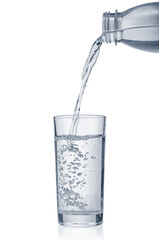 Flowing pure water into glass isolated on white background