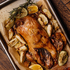 Christmas dinner with duck and apples, festive table setting, New Year.