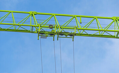 construction crane at blue sky as background