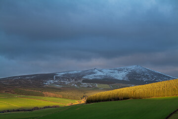 DUFFTOWN, MORAY, SCOTLAND - 1 DECEMBER 2021: This is the peak of Moray, Ben Rinnes with some snow...