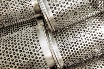 background of perforated metal sheets with round holes