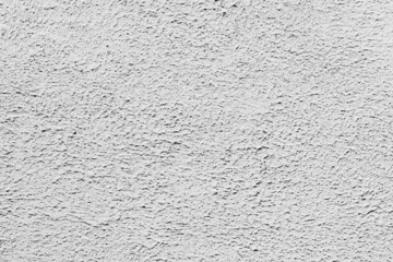 Texture of a concrete wall with cracks and scratches which can be used as a background