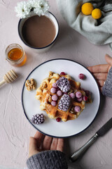 Waffles with fresh fruit and hot chocolate. Sweet and delicious snack or breakfast for those with a sweet tooth