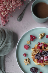 Waffles with fresh fruit and hot chocolate. Sweet and delicious snack or breakfast for those with a sweet tooth