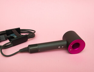 Dyson Supersonic hair dryer attachments in use haircare fuchsia/nickel 