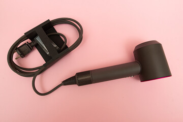 Dyson Supersonic hair dryer attachments in use haircare fuchsia/nickel 