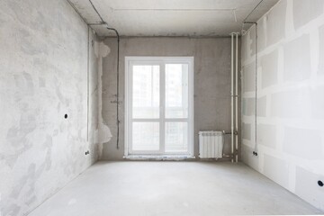 interior of the apartment without decoration in gray colors