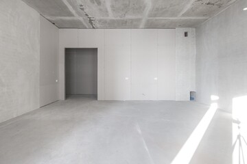 Obraz premium interior of the apartment without decoration in gray colors