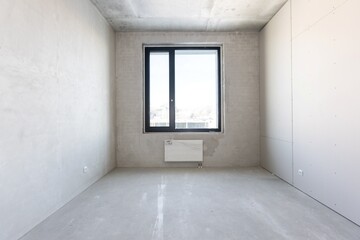 Obraz premium interior of the apartment without decoration in gray colors