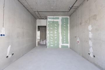 interior of the apartment without decoration in gray colors