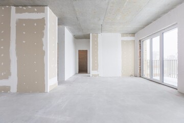 Fototapeta premium interior of the apartment without decoration in gray colors