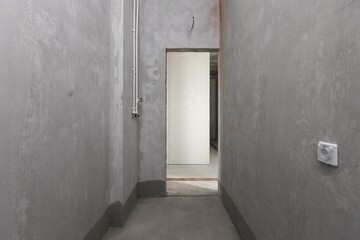 Fototapeta premium interior of the apartment without decoration in gray colors