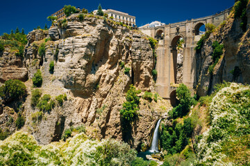 Fototapeta na wymiar The New Bridge - Puente Nuevo and waterfall in Ronda, Province Of Malaga, Spain.