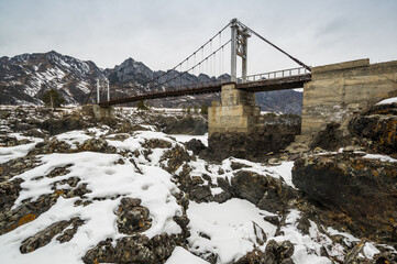 View of the bridge over river Katun in Altay mountains