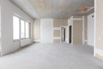 interior of the apartment without decoration in gray colors