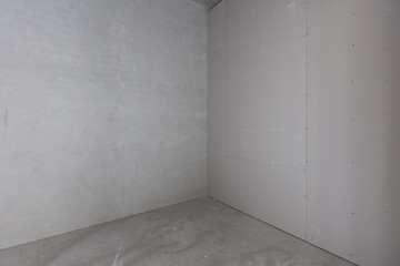 interior of the apartment without decoration in gray colors