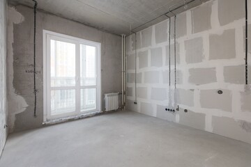 interior of the apartment without decoration in gray colors