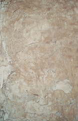 Old rough  plaster wall surface .  Old cement wall, concrete surface with the rough and scratched surface.
